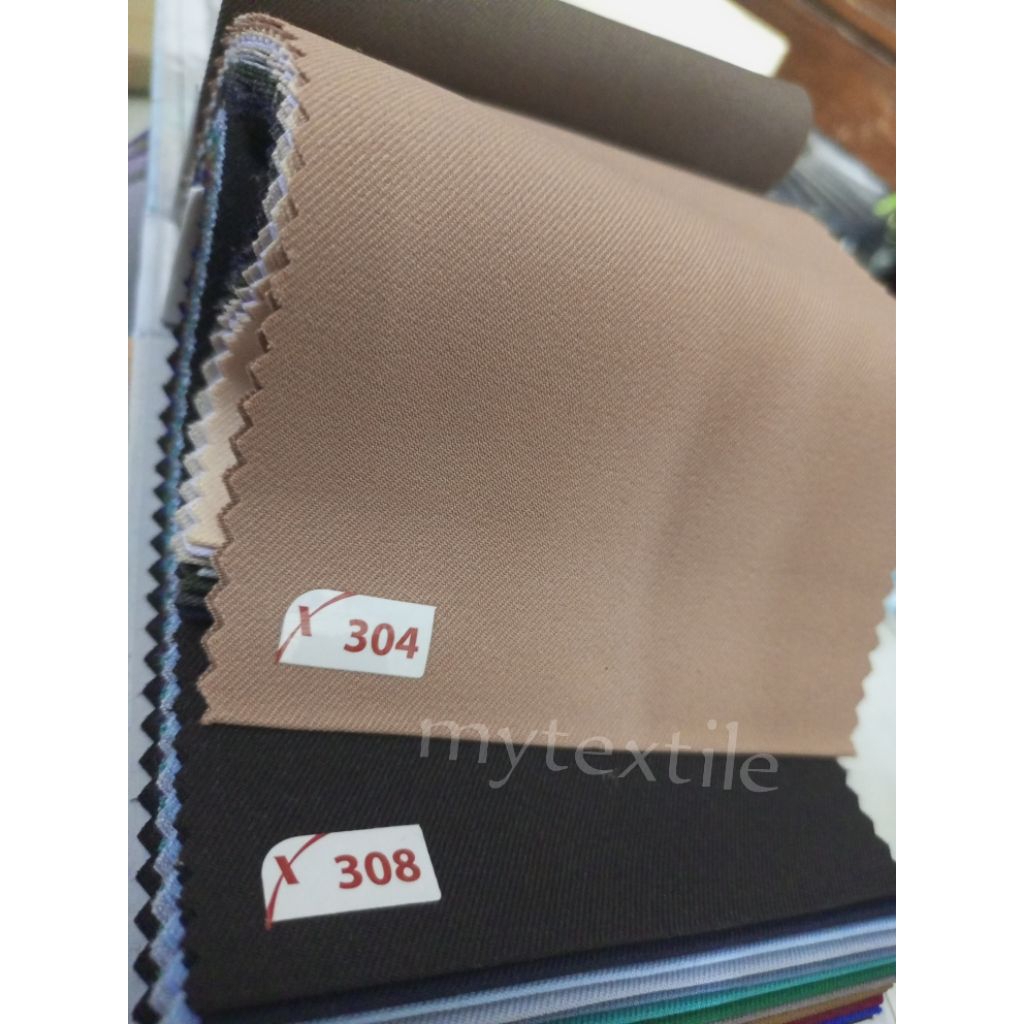 kain seragam pramuka maximotion