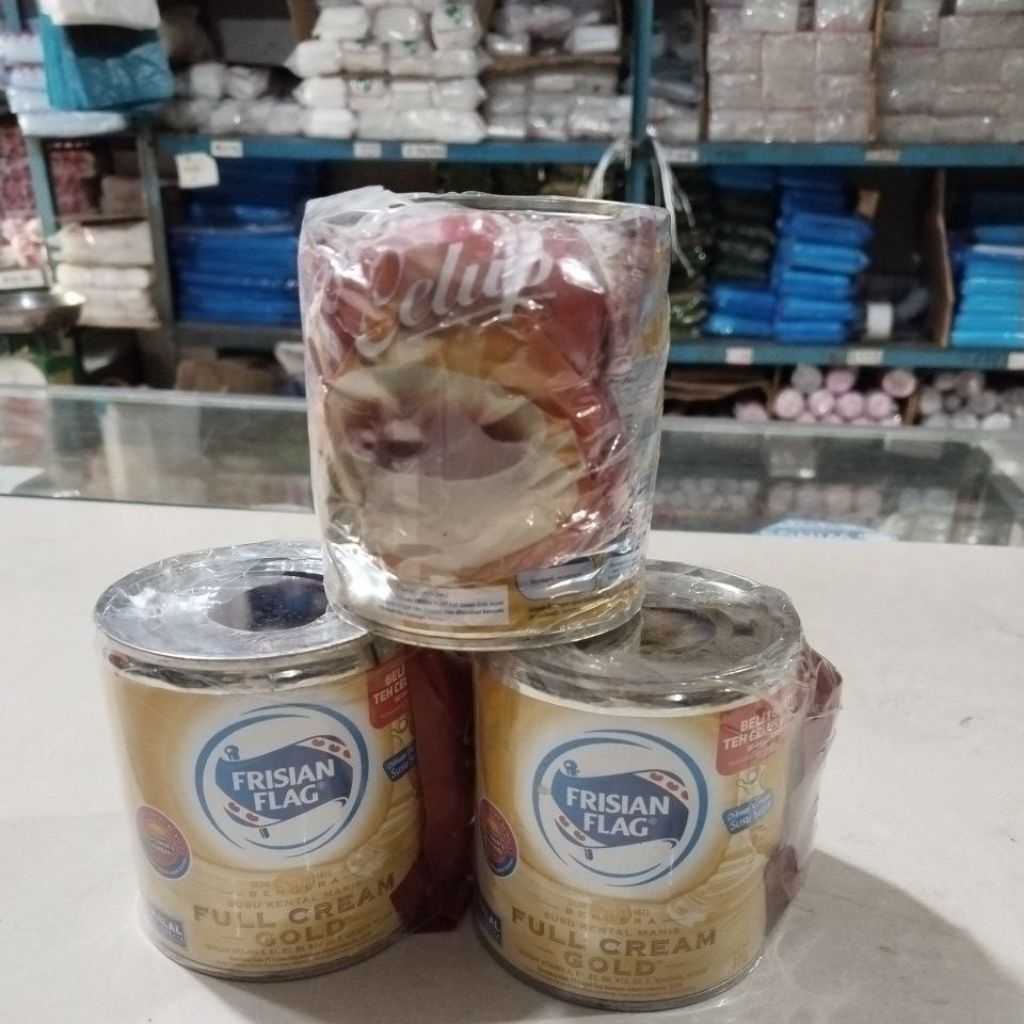 

Frisian flag gold kaleng 370g bonus teh sosro 1 sachet