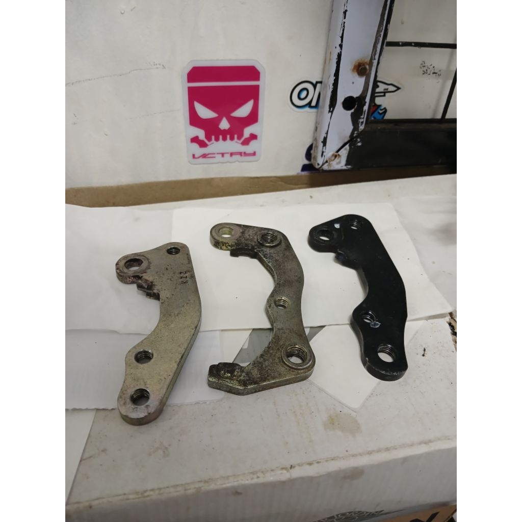 Breaket Kaliper Cakram Depan klx150 original standar copotan motor