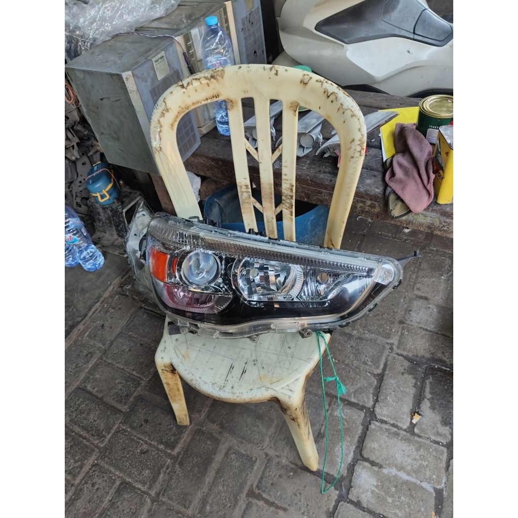 Headlamp Mitsubishi Outlander sport HID Original.