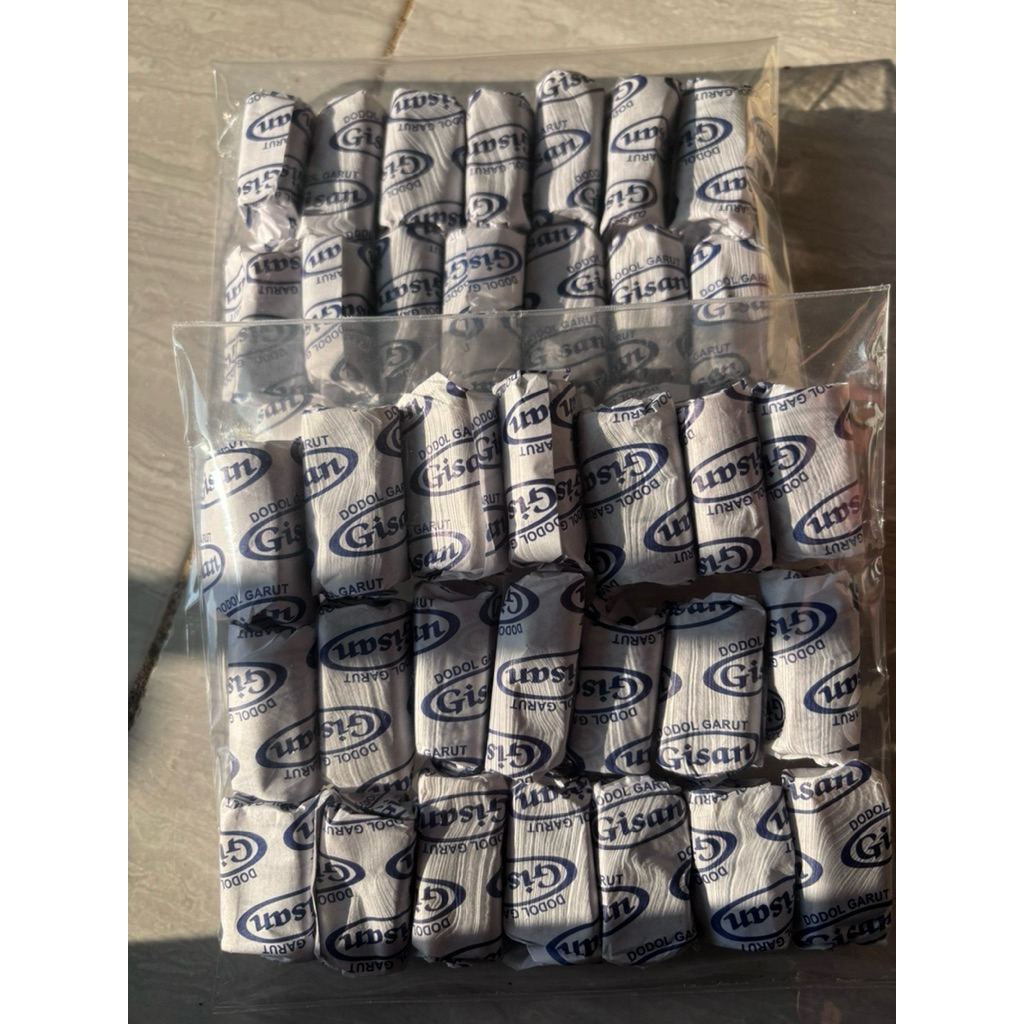 

DODOL GARUT GISAN ENAK KUALITAS TERJAMIN