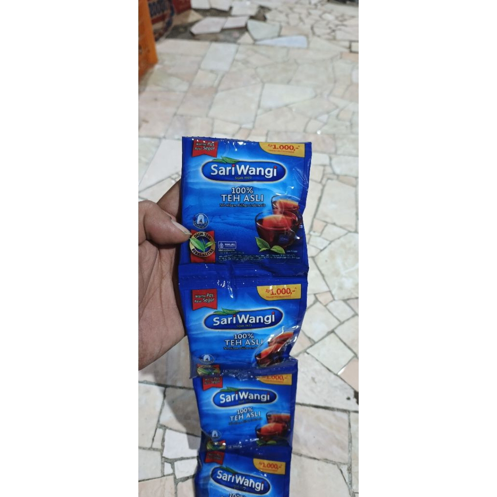 

SariWangi 100% teh original per renceng isi 6 sachet