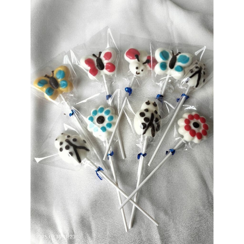 

coklat karakter mix bunga,kumbang,kupu2 kartun