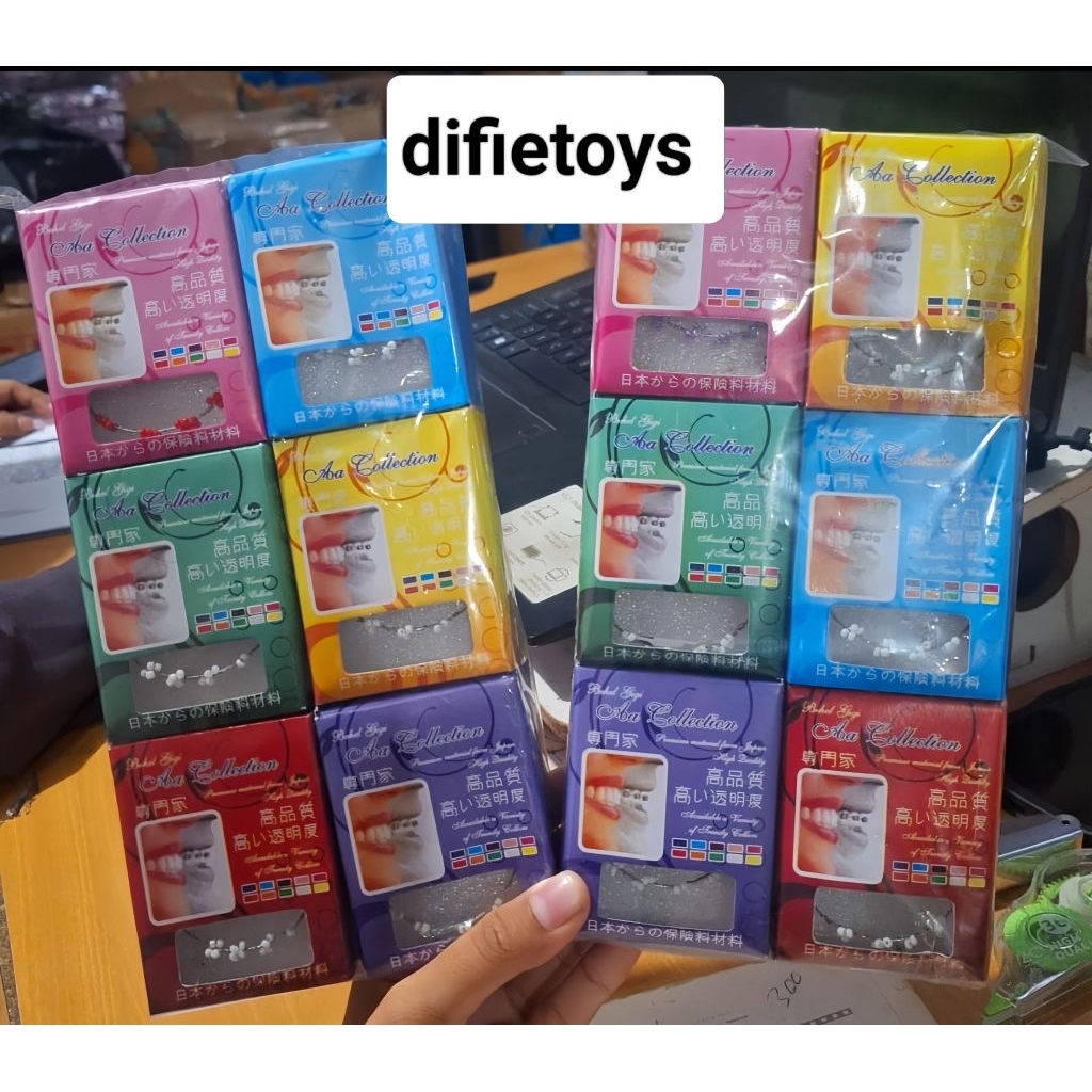 12 pcs mainan behel gigi kotak