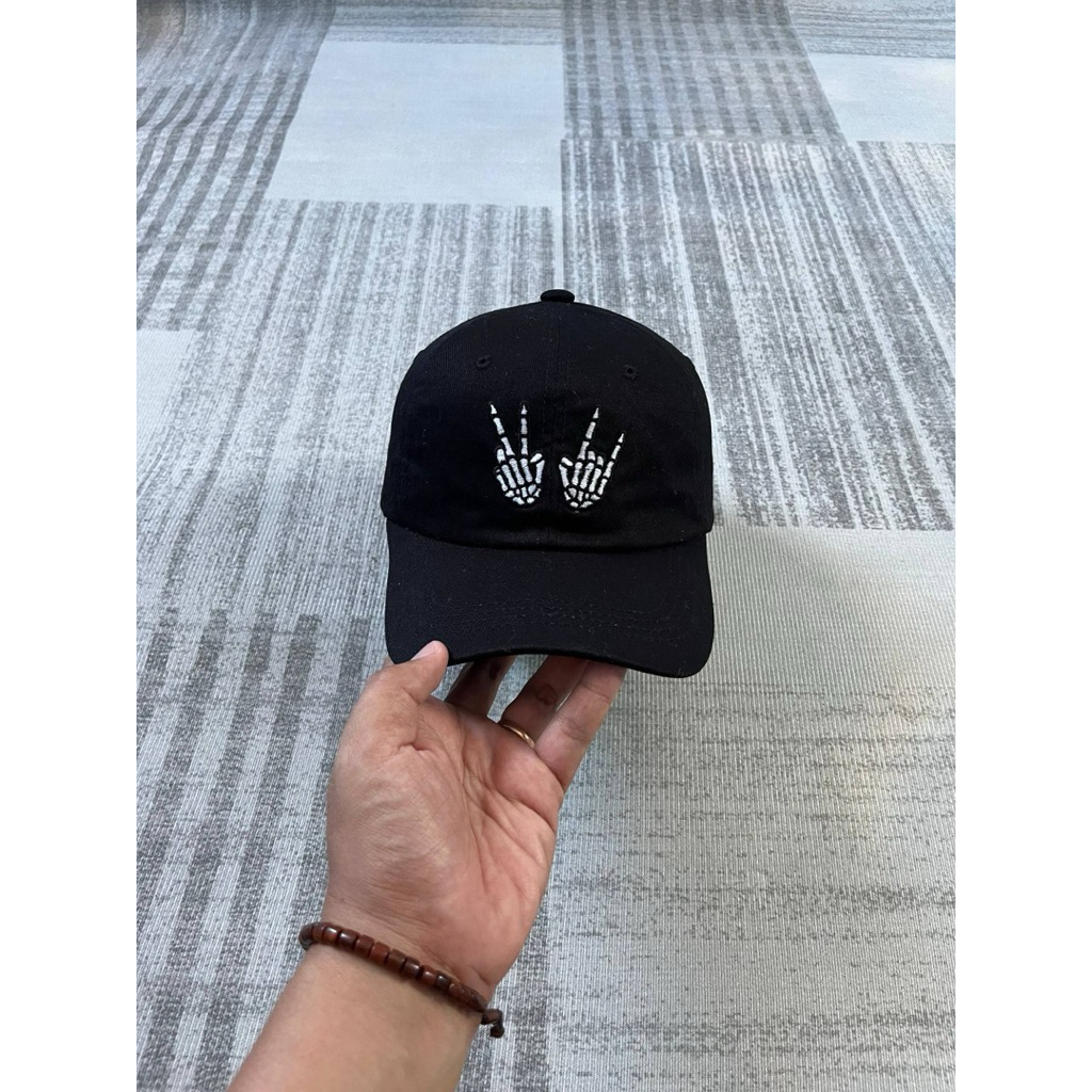 Cap Tangan dan Stigma