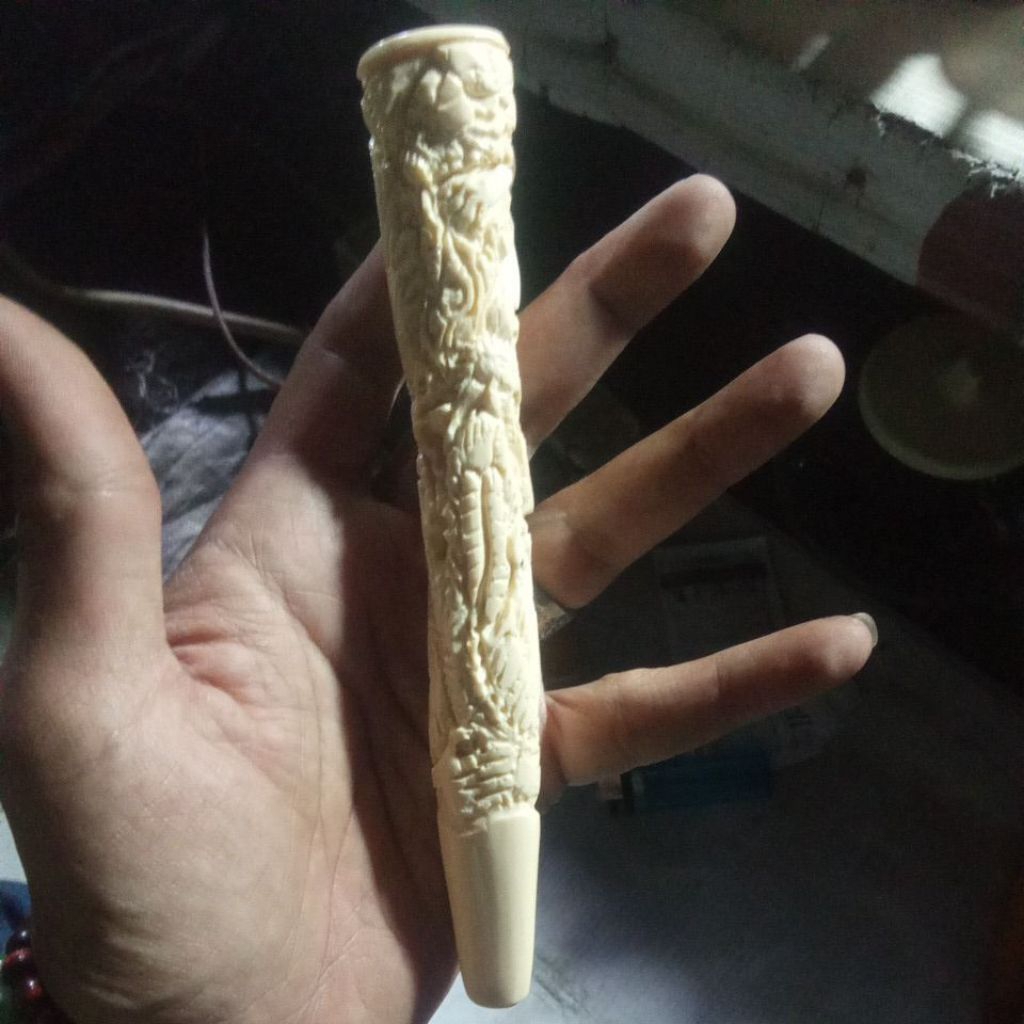 once sari gading ukir naga