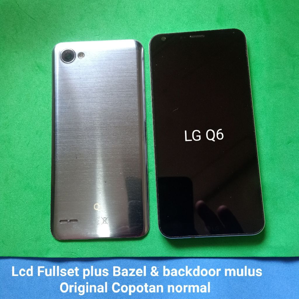 Lcd touchscreen fullset + Bazel backdoor  LG Q6 Original Copotan mulus sesuai gambar Garansi
