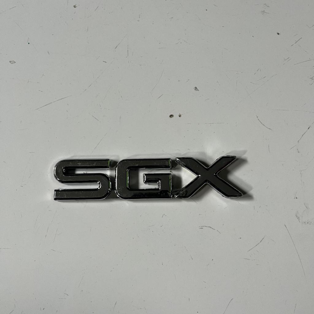 Emblem SGX Toyota Kijang Kapsul