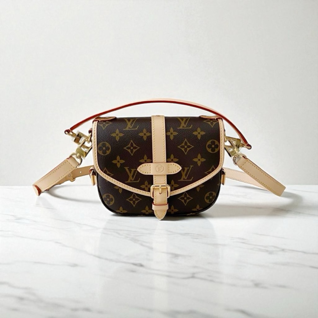 LOUIS VUITTON LV Saumur BB Shoulder Crossbody Top Handle Bag / Handbag in Monogram Coated Canvas