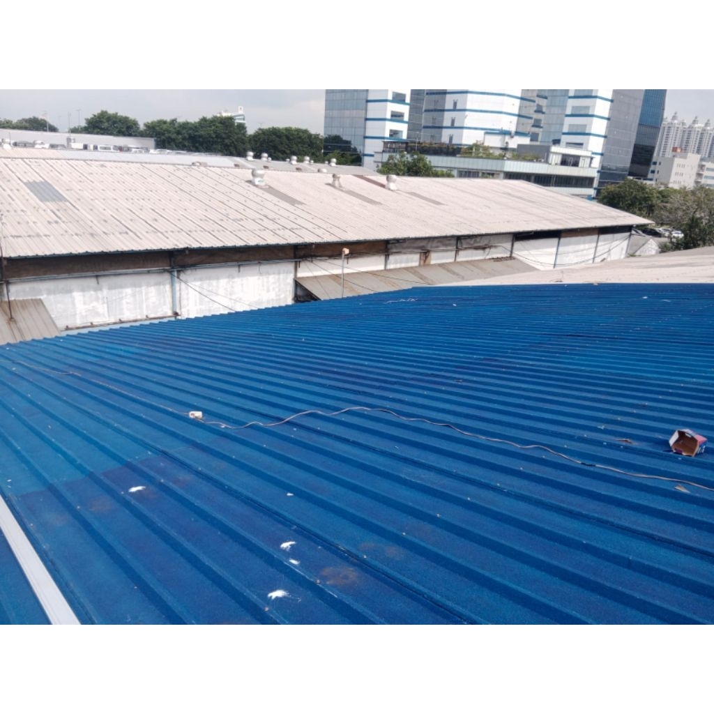 Pemasangan atap Spandek Pasiran warna