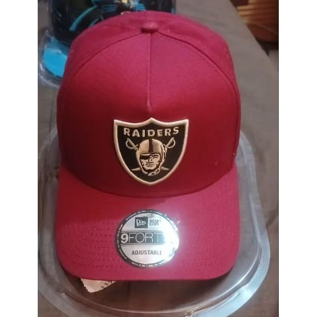 topi new era capback raiders.