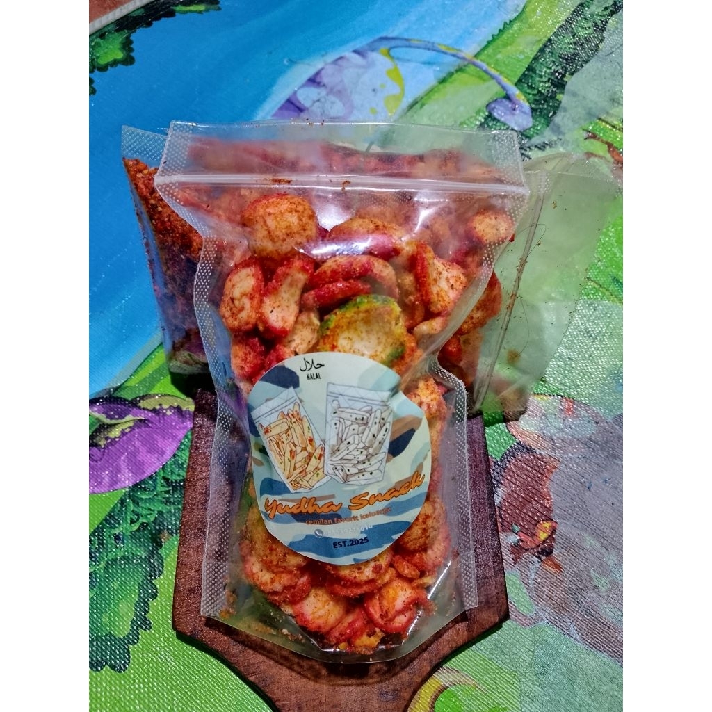 

Kerupuk seblak kencur pedas 100% halal