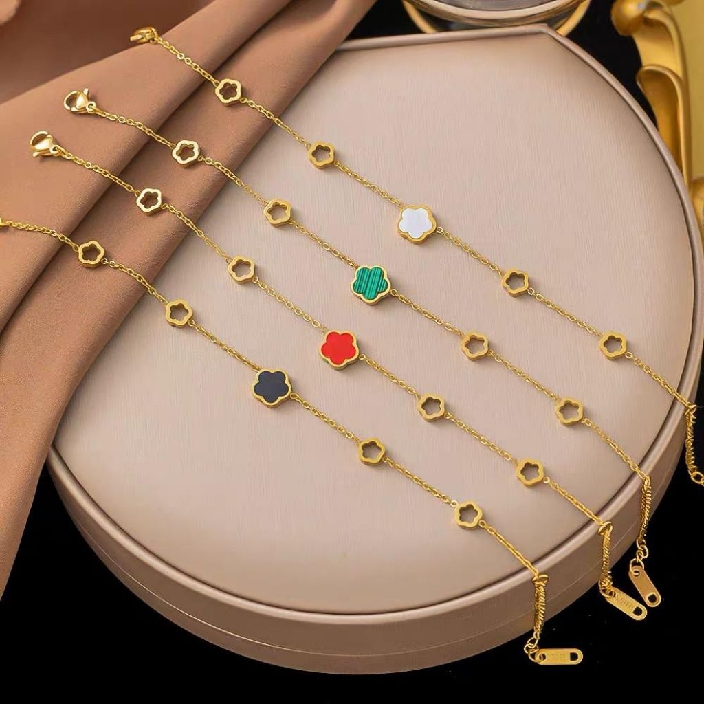 Gelang titanium bunga tunggal minimalis