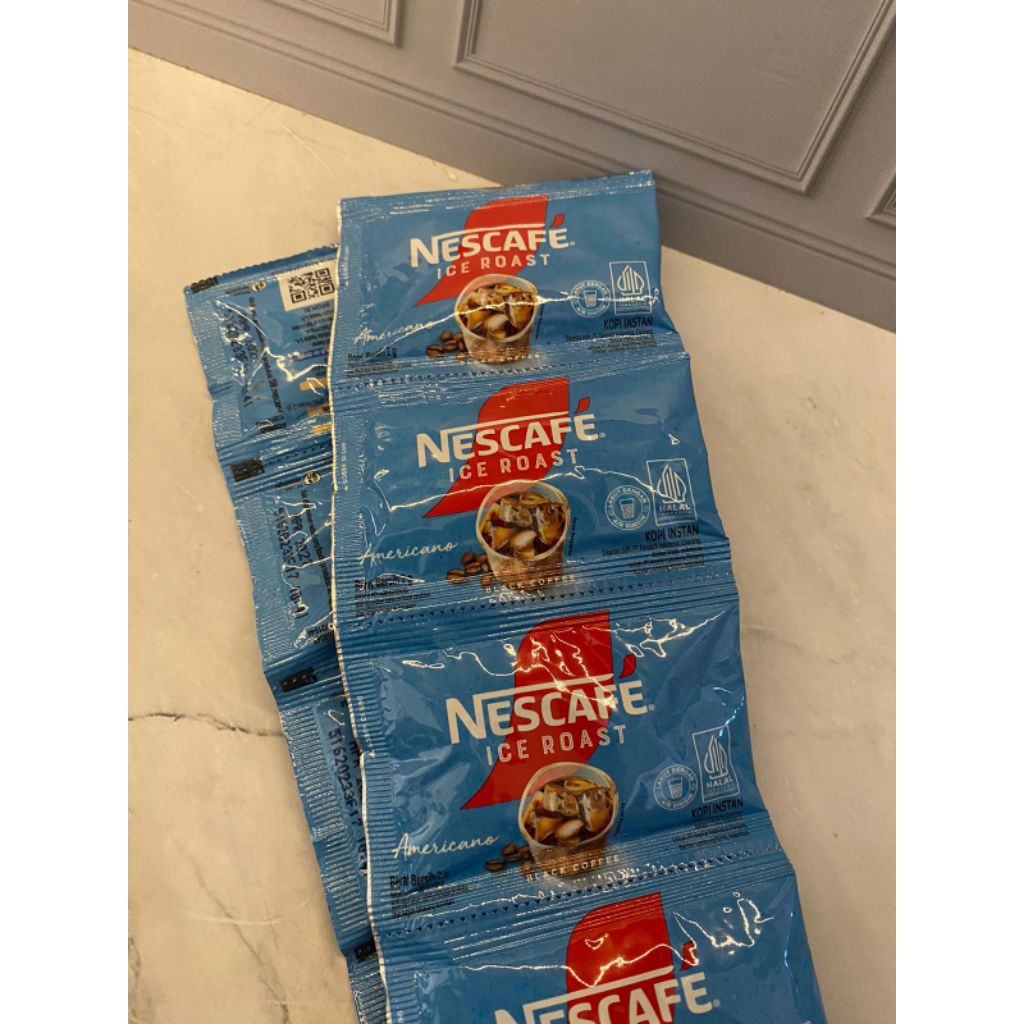 

Nescafe Ice Roast Americano - Kopi Instant Sachet - 1 Renceng Isi 10 pcs (10 x 2gr)