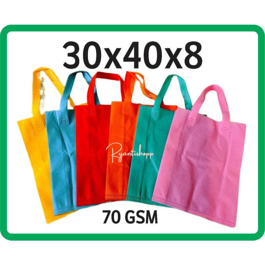 

Tas Spunbond Goodiebag Tebal Polos Serbaguna /Tas Spunbond Tali Lipat Samping uk 30x40x8 cm