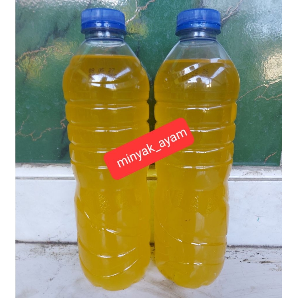 

dua botol minyak ayam kampung
