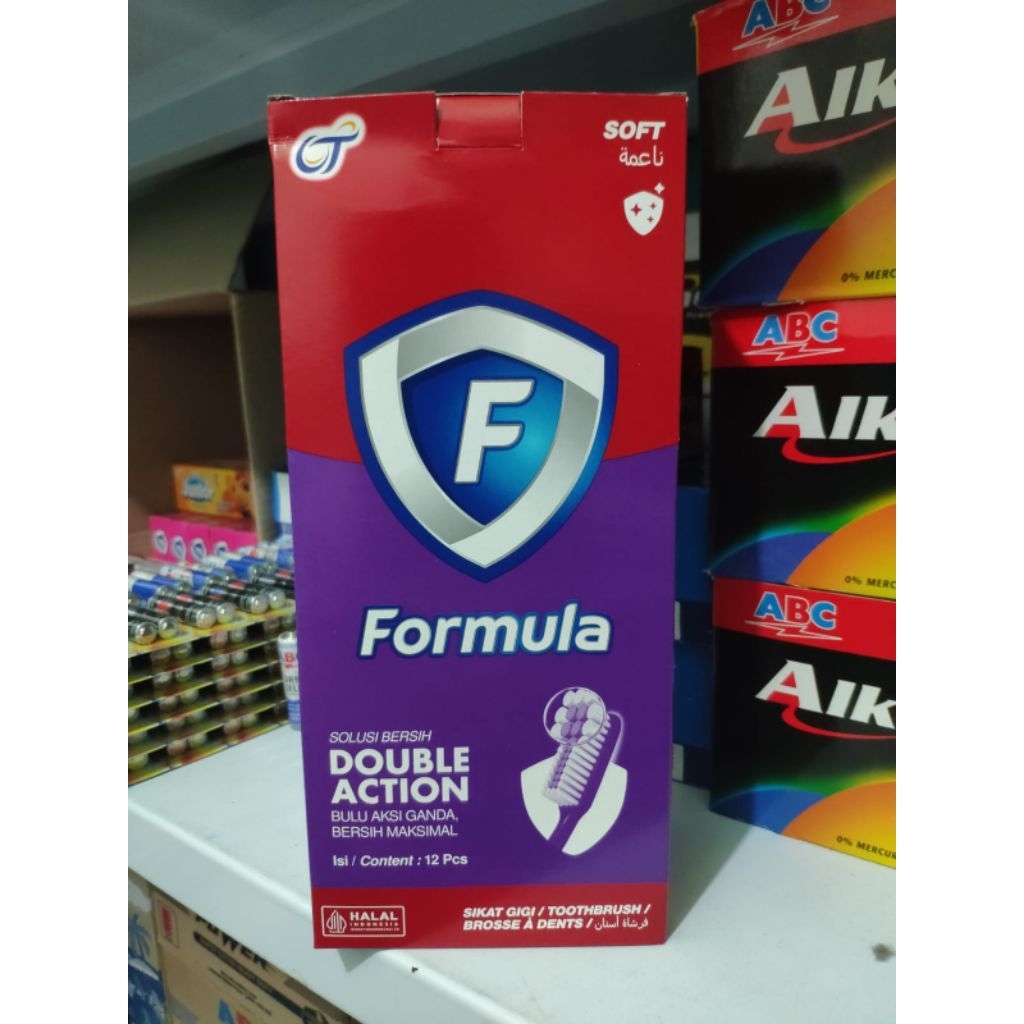 sikat gigi formula double action