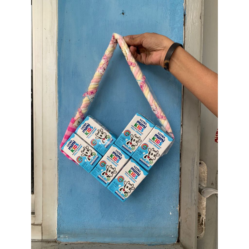 

Buket susu bentuk love