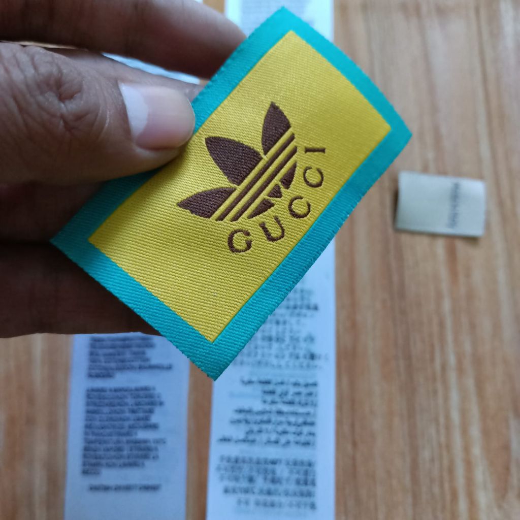 

tag label Gucci x Adidas