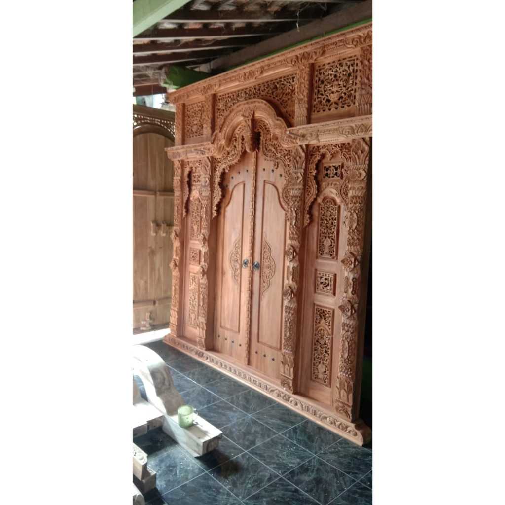 pintu rumah model gebyok ukir jepara bahan kayu jati ukuran 3 meter