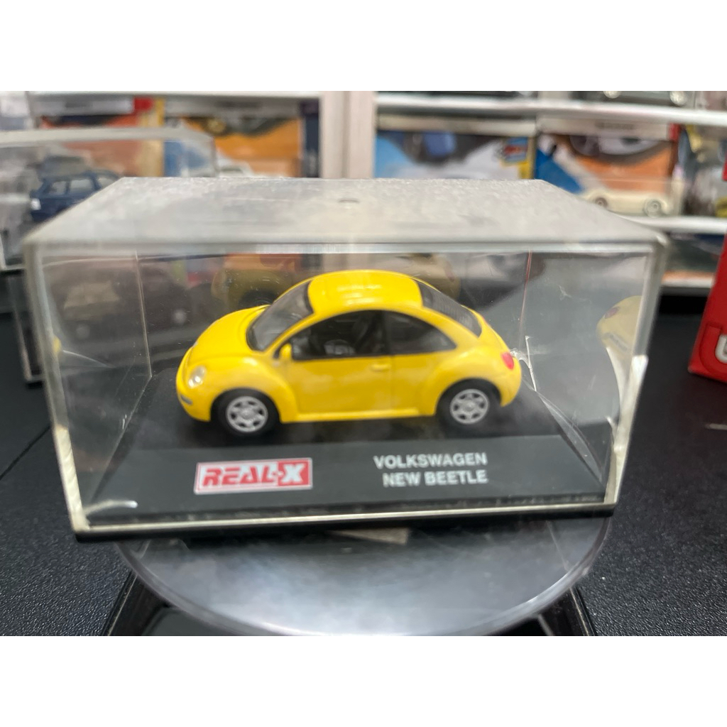 Real X Volkswagen new beetle