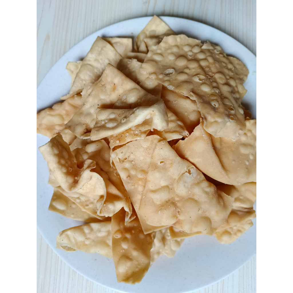 

Keripik Pangsit Bawang 1/2 Kg (500Gr) Snack Cemilan