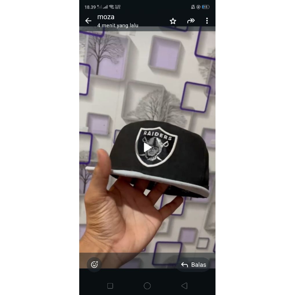 topi newera raiders