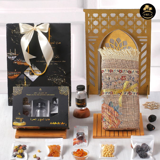 

Oleh oleh Umroh dan Haji Premium / Paket Oleh oleh Umroh dan Haji / Sajadah Paperbag Kurma Ajwa Air zam zam asli 100%