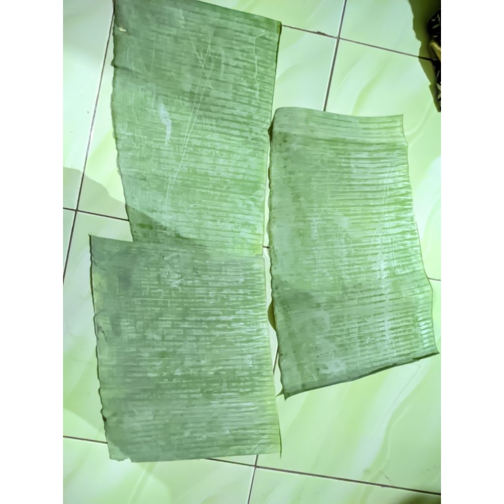 

daun pisang siap pakai/daun pisang bungkus timbel /daun pissang sudah di rerab atau di panaskan 500 3 lembar besar