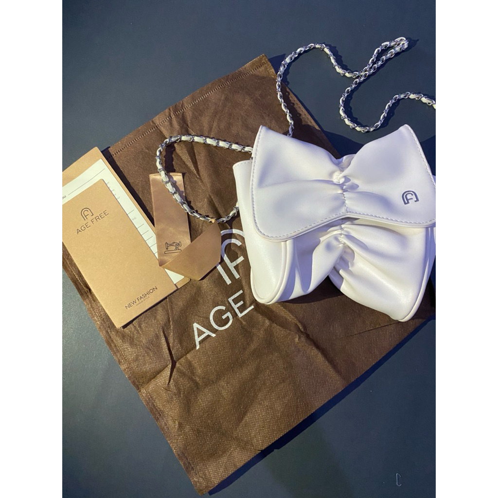 Preloved Tas Age Free Mini Ribon Sling Bag Putih