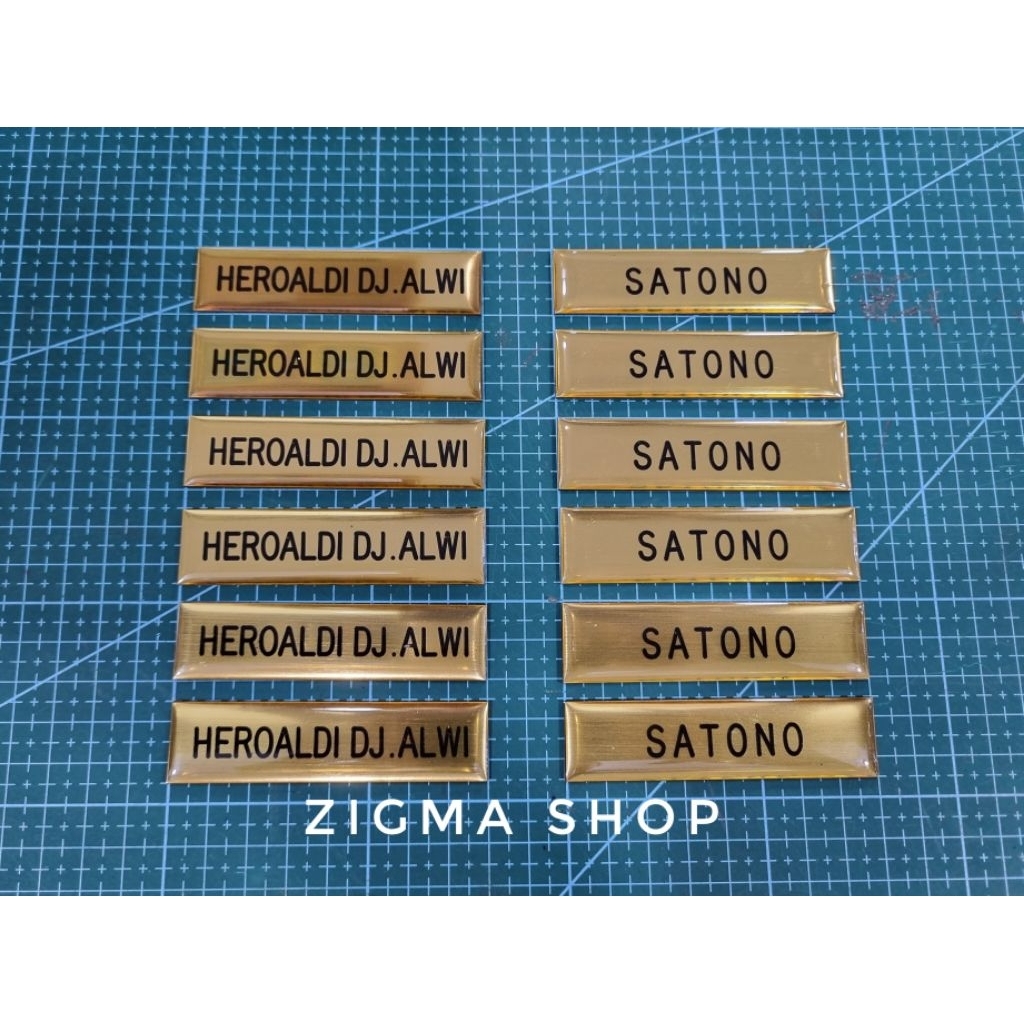 

Nama dada | name tag dasar gold viber | magnet | peniti | paku