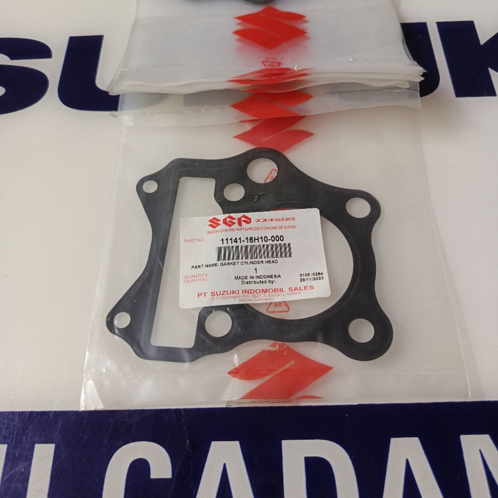 PAKING GASKET BLOK HEAD SHOGUN FL 125 PAKING  BLOK HEAD SUZUKI SHOGUN FL 125 ORIGINAL SGP