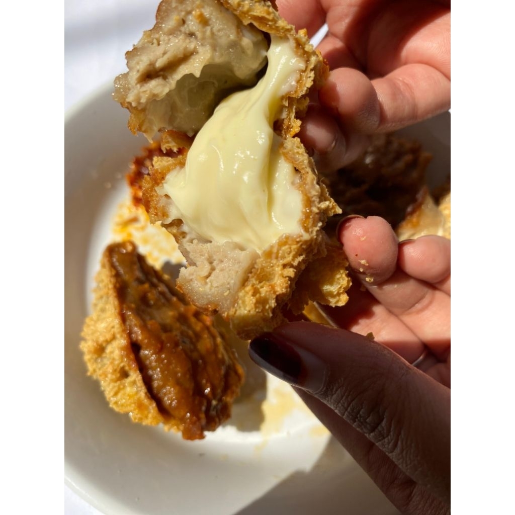 

Tahu bakso walik varian keju lumer moncrot, tetelan pedas by boci granat