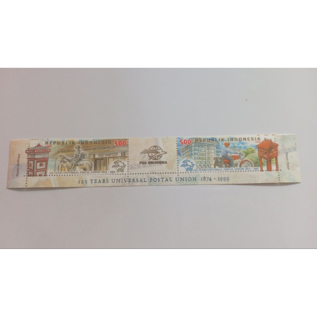 

2 pcs Perangko Seri 125 Years Universal Postal Union 1874 - 1999