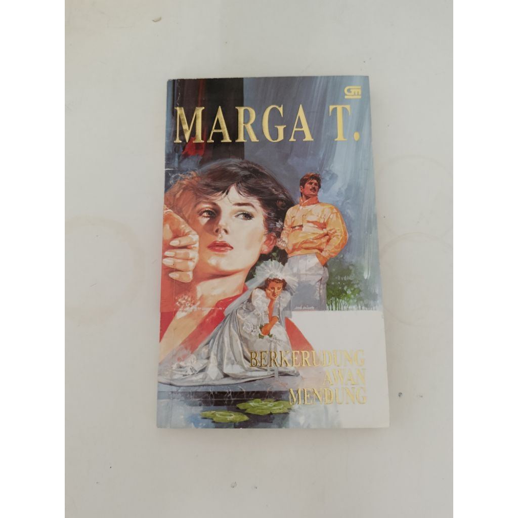 preloved Marga T Berkerudung awan mendung