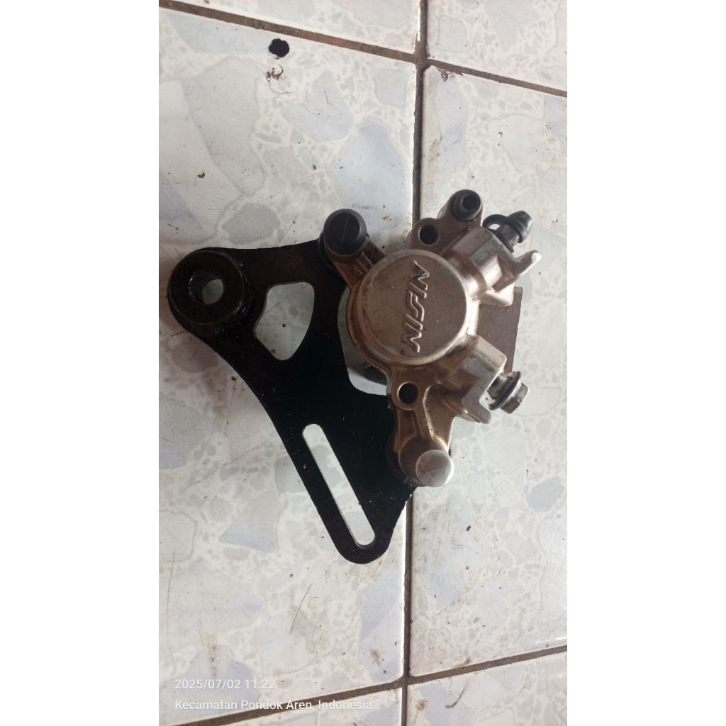 Kaliper rem belakang Nissin second copotan motor Suzuki Satria Fu