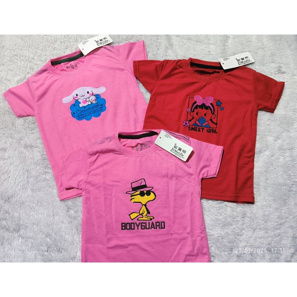 

Baju anak dan jilbab Tari