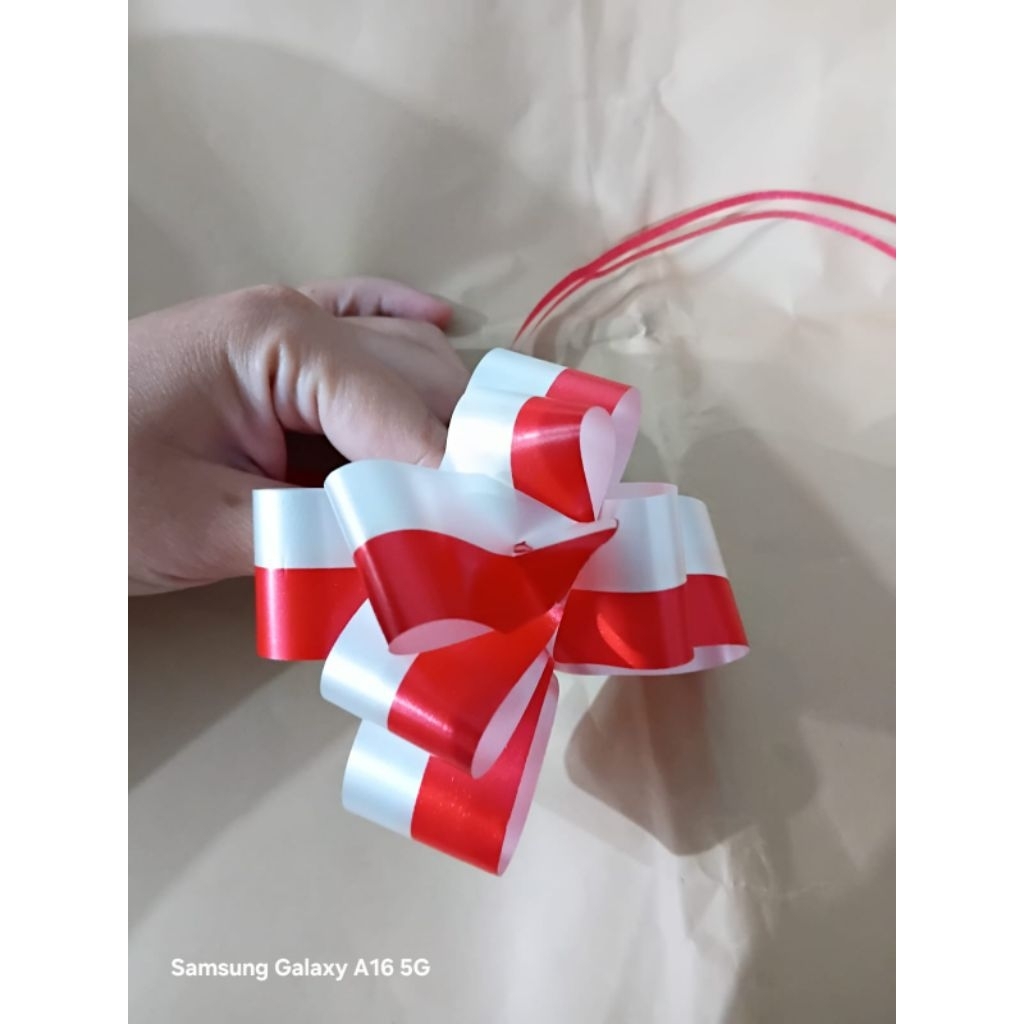 

Pita Tarik Merah Putih Tanpa Renda 32 mm Pita Kado Merah Putih Ribbon Serut Bendera 32mm