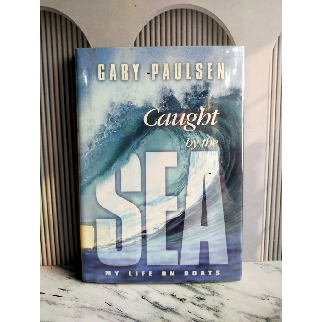 Buku Import Cought by The Sea by Cary Paulsen Original
