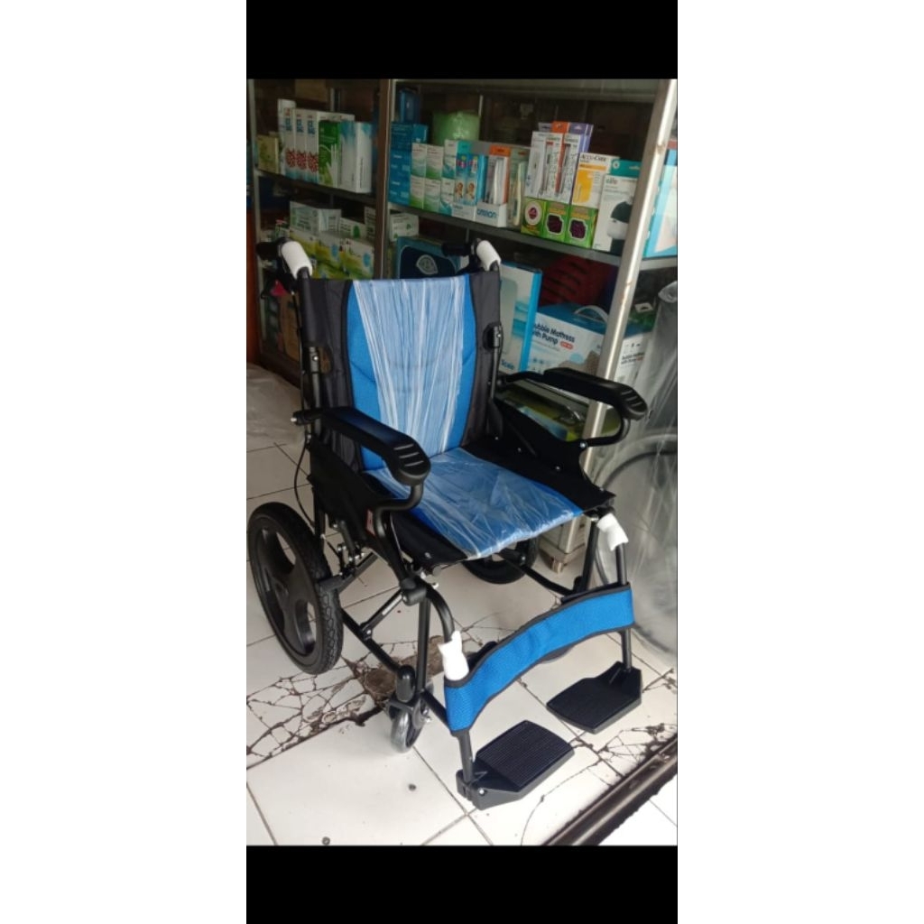 kursi roda traveling kecil