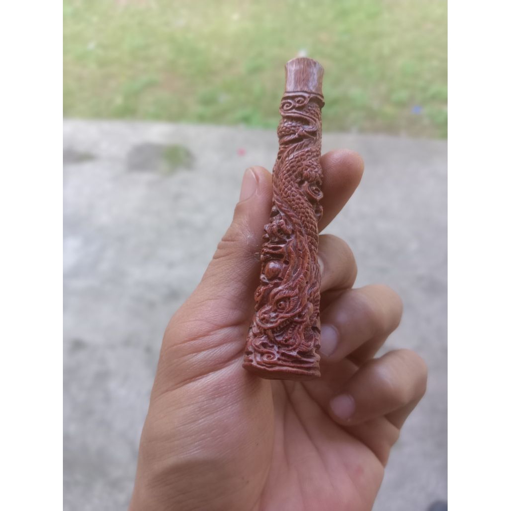 once ukir nogo kayu stigi tua