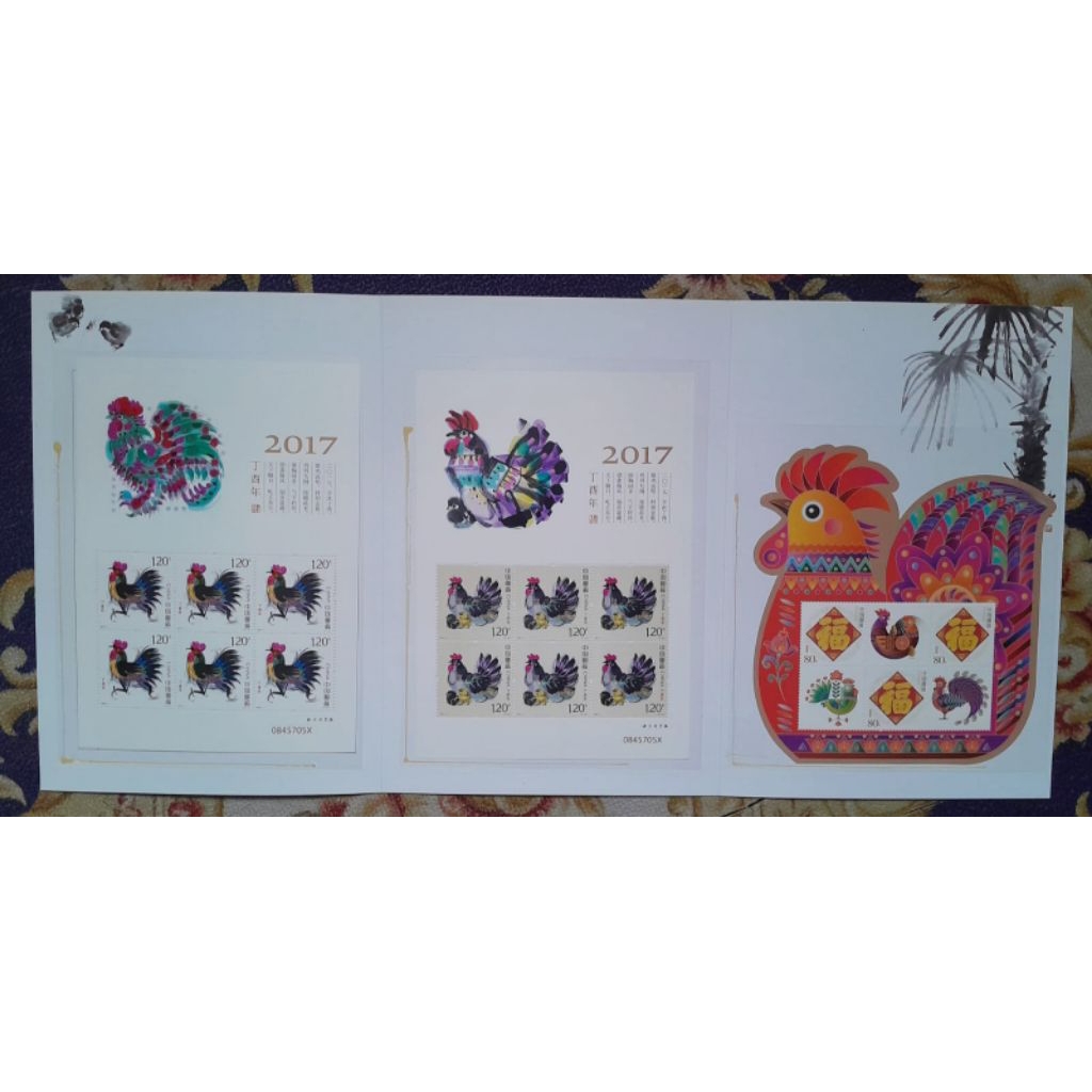 

PRANGKO CHINA DENGAN FOLDER YEAR OF THE ROOSTER