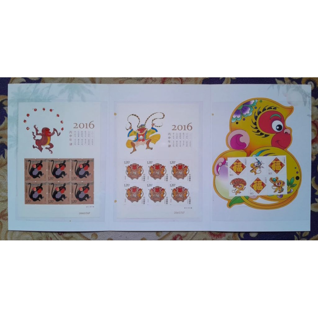 

PRANGKO CHINA DENGAN FOLDER YEAR OF THE MONKEY