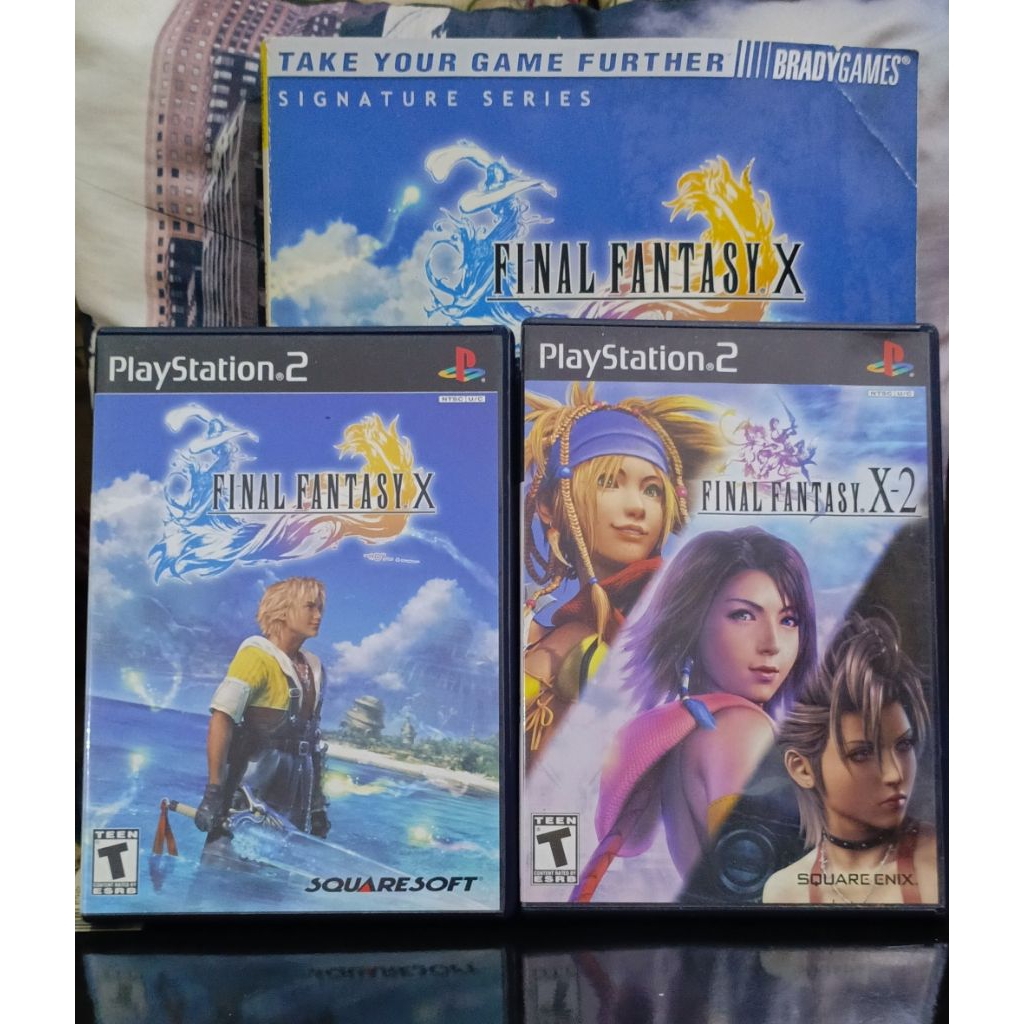 Game Ps2 FINAL FANTASY X dan X-2. BONUS : BUKU STRATEGY GUIDE. Kaset Ps2 R1 ORI USA