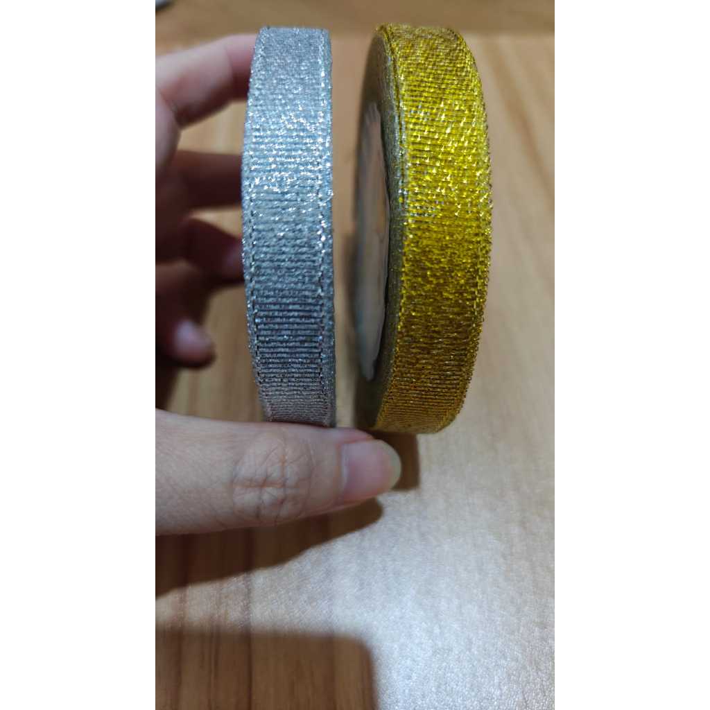 

Pita Emas Perak Gliter Lebar 1,25 cm dan 2 cm Pita Emas Glitter Pita Perak Glitter Pita Murah