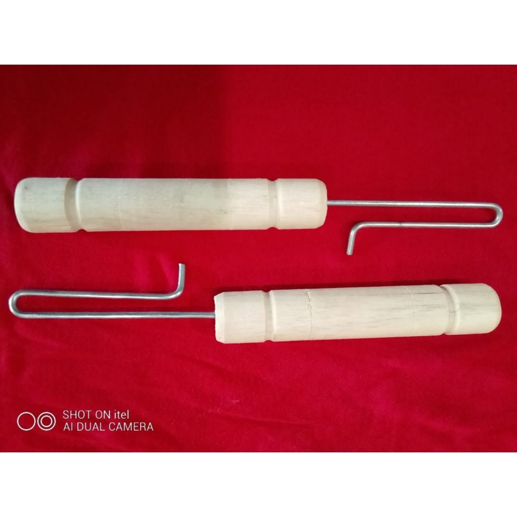 alat ikat es Mambo/es lilin