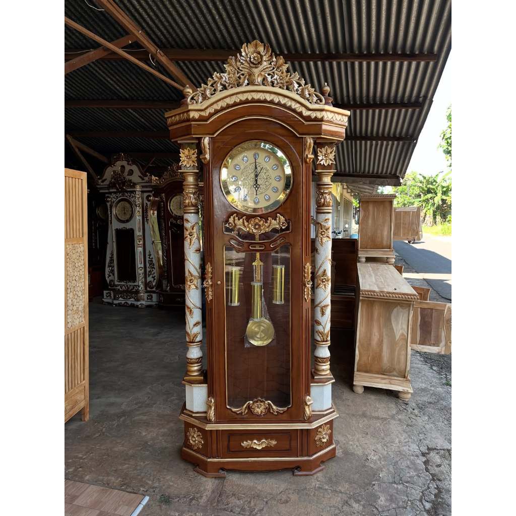 Lemari Jam Hias Ukiran Jati Antik Emas