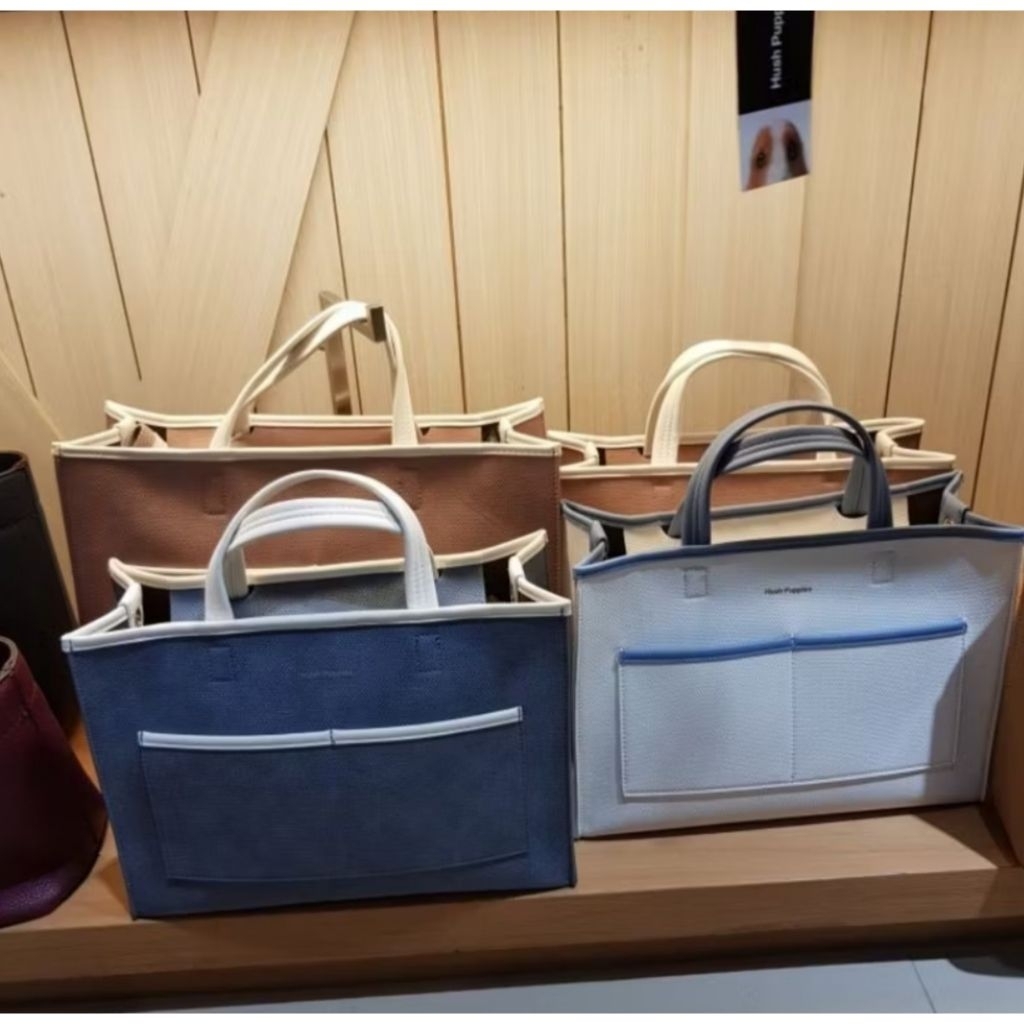 Preloved - Tas duffy handheld wanita merk Hush Puppies