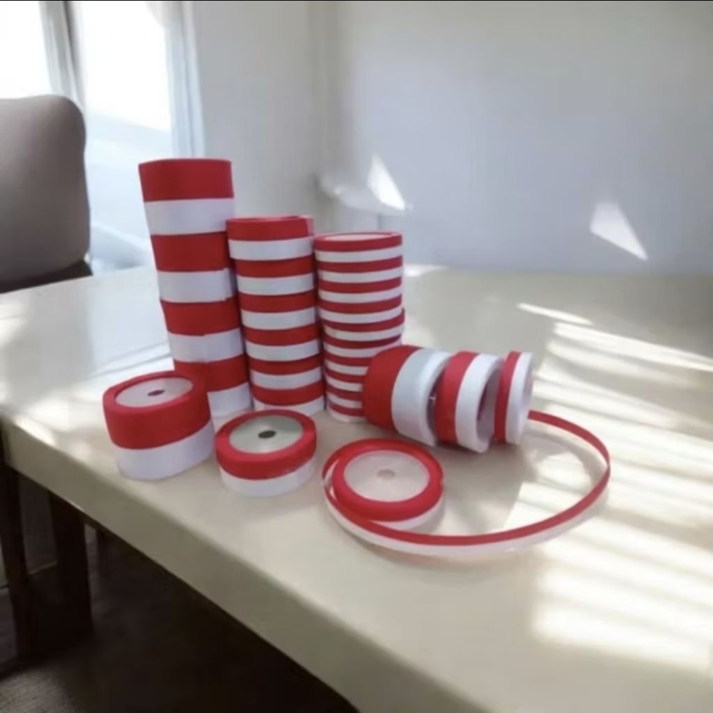 

PITA SATIN KAIN MERAH PUTIH ROLL 1,2cm & 4 cm