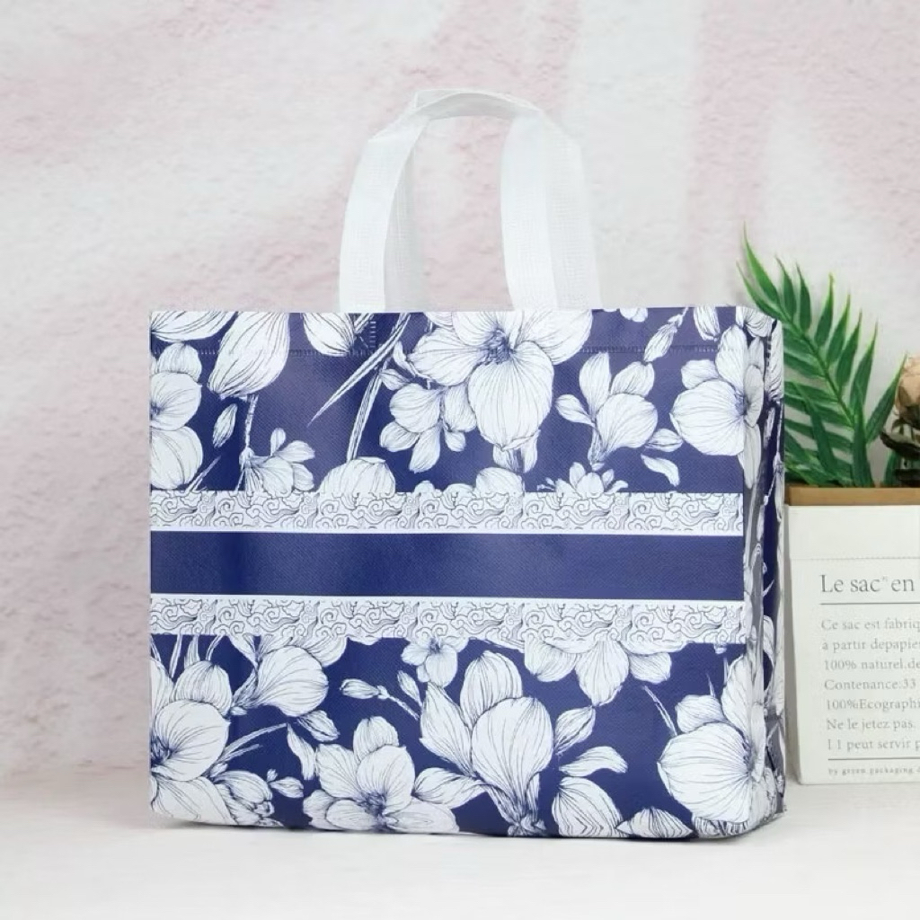 

Tas Kado Gift Hampers Souvenir Motif Bunga Tas Spunbond / Goodie Bag Spunbond / Spunbond Bag / Tas Spunbond Motif / Tas Belanja